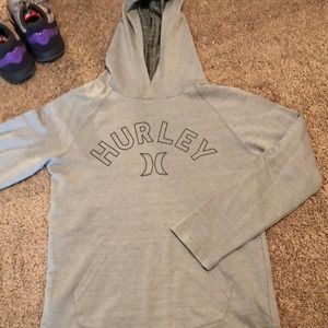 Never worn !  Hurley thin pullover with front pocket and hood